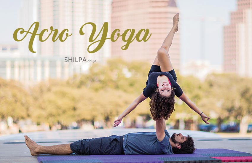 Three People Acro Yoga Pose